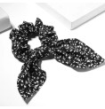 CHOUCHOU AVEC NOEUD IMPRIME FLORAL NOIR CHOUCHOU AVEC NOEUD IMPRIME FLORAL NOIR